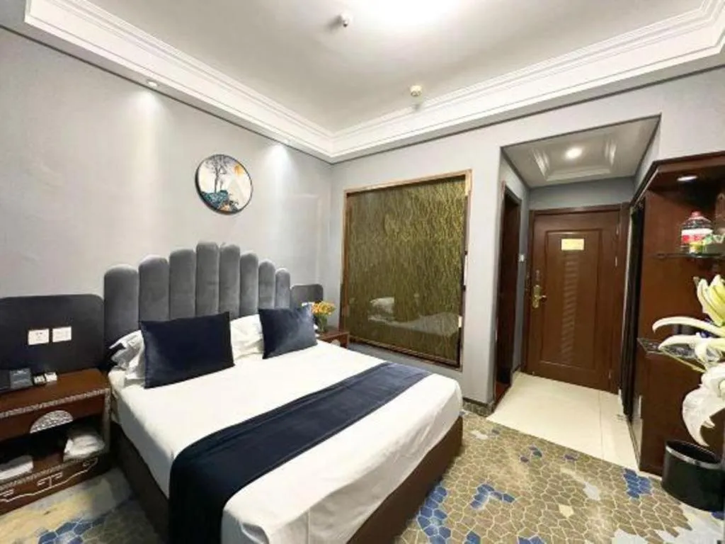 Bed in Dunhuang Dunhe Hotel