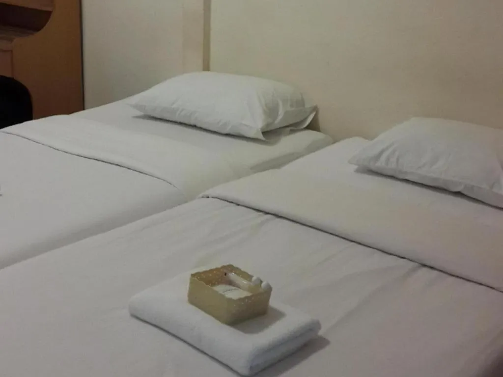 Bed in New Maleena Ville Hotel