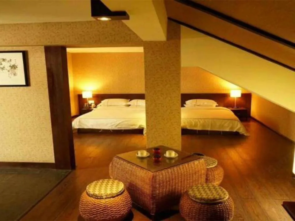 Bed in Lijiang Ziyue Hotel