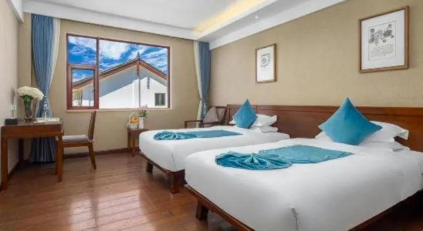 Bed in Lijiang Ziyue Hotel