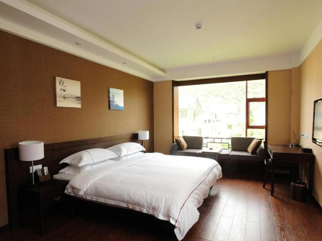 Bed in Lijiang Ziyue Hotel