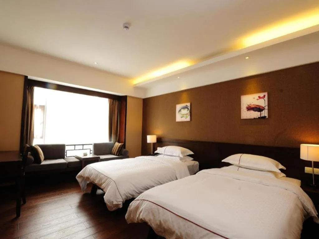 Bed in Lijiang Ziyue Hotel