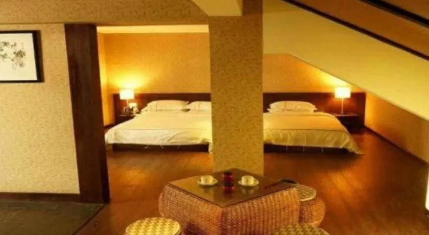 Bed in Lijiang Ziyue Hotel