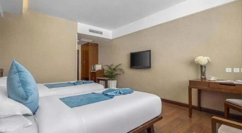 Bed in Lijiang Ziyue Hotel