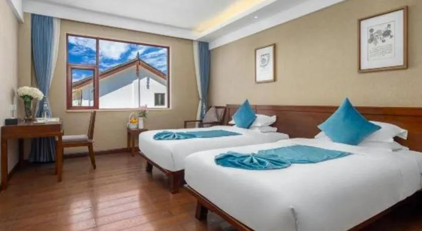 Bed in Lijiang Ziyue Hotel