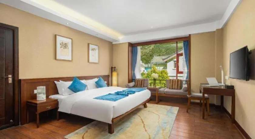 Bed in Lijiang Ziyue Hotel