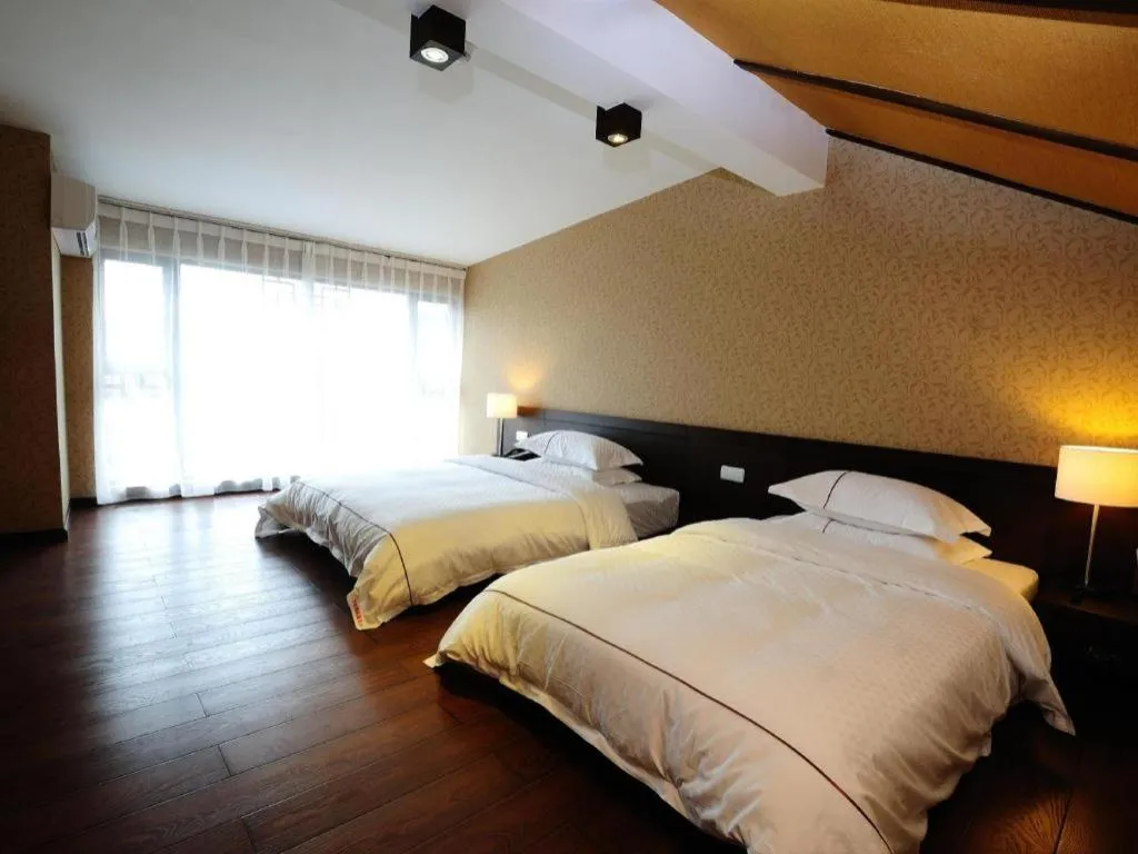 Bed in Lijiang Ziyue Hotel