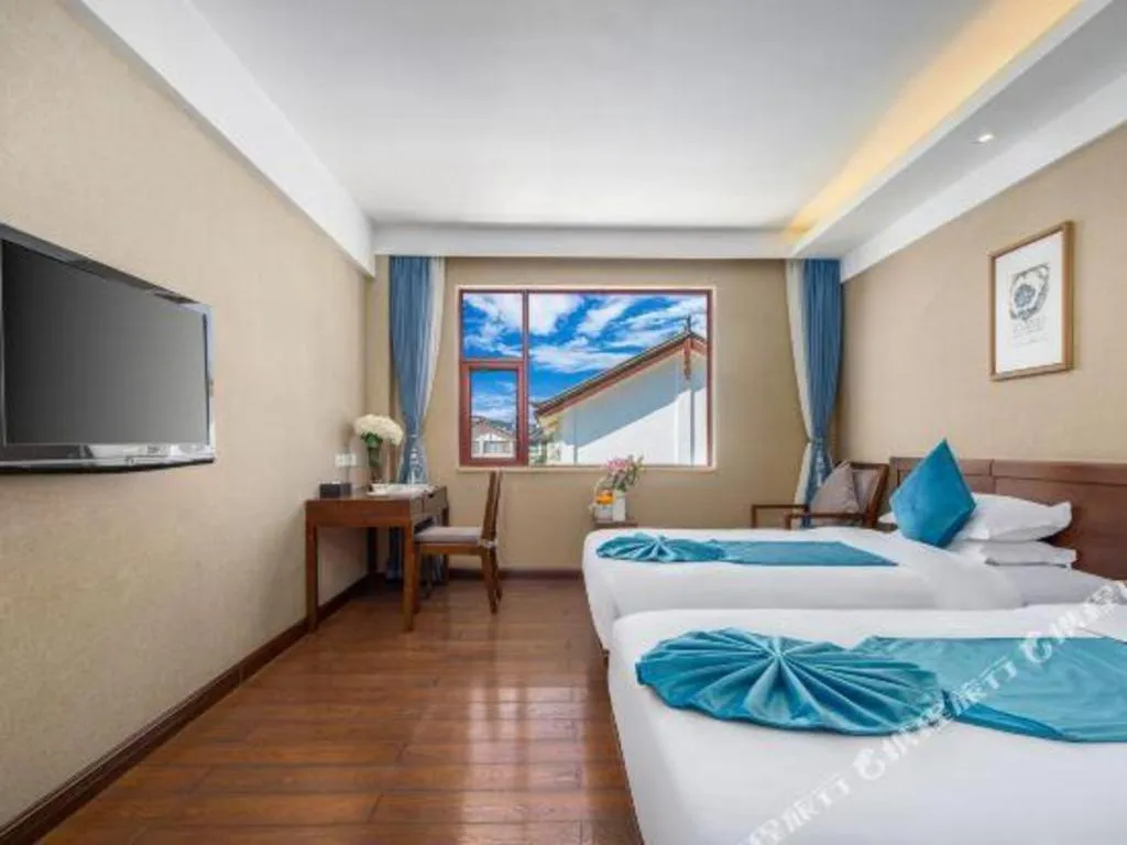 Bed in Lijiang Ziyue Hotel