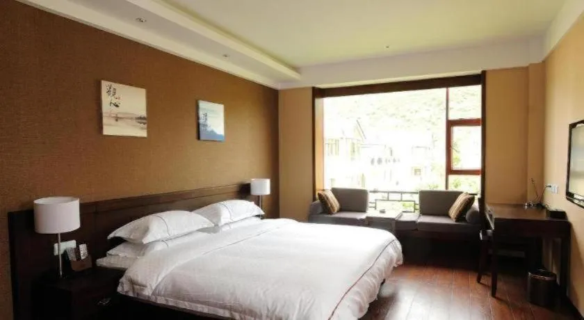Bed in Lijiang Ziyue Hotel