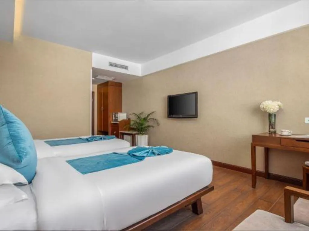 Bed in Lijiang Ziyue Hotel