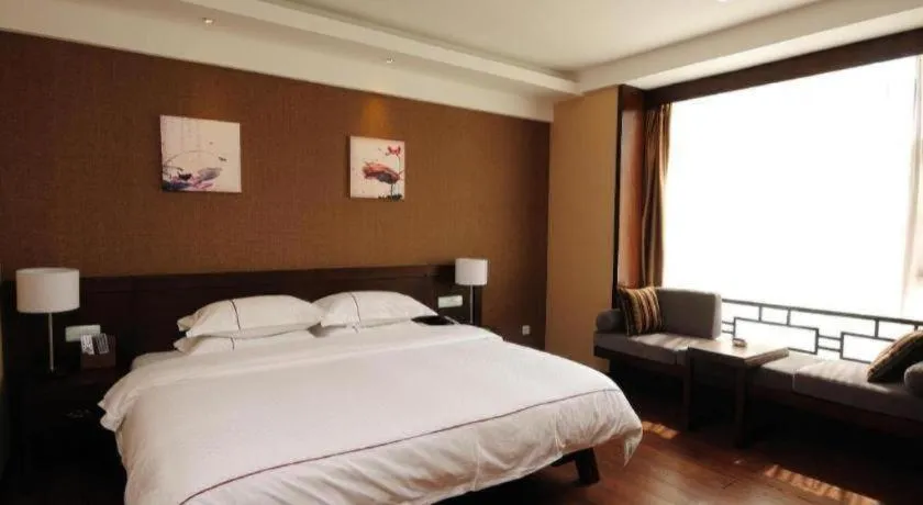 Bed in Lijiang Ziyue Hotel