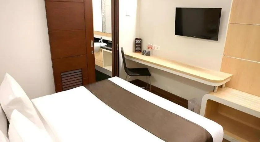 Bed in Sub City Hotel