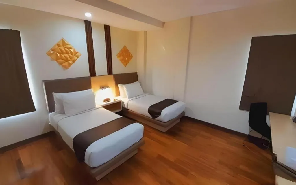 Bed in Sub City Hotel