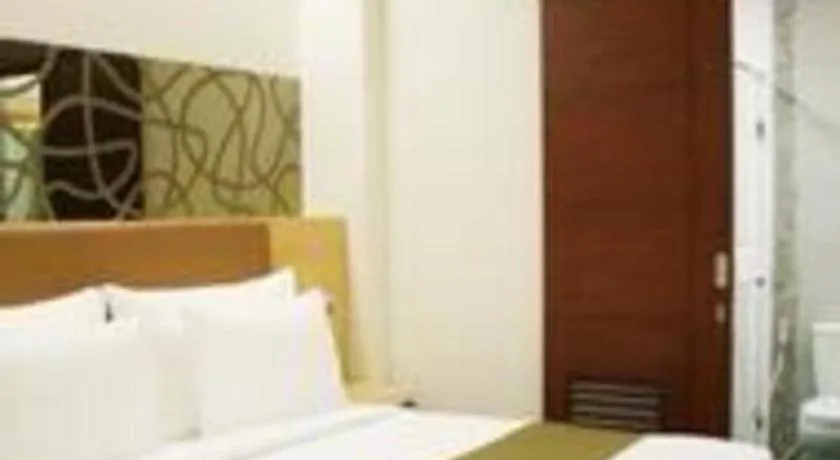 Bed in Sub City Hotel