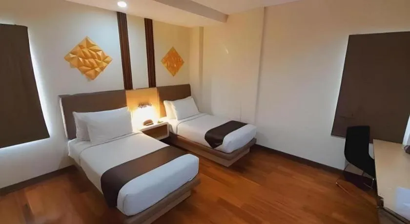 Bed in Sub City Hotel