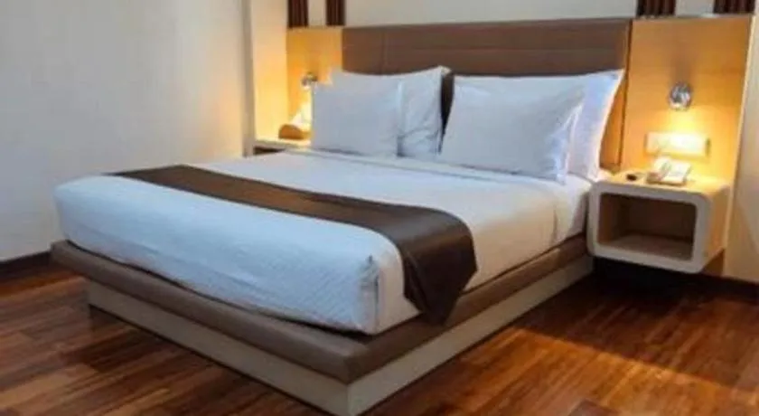 Bed in Sub City Hotel