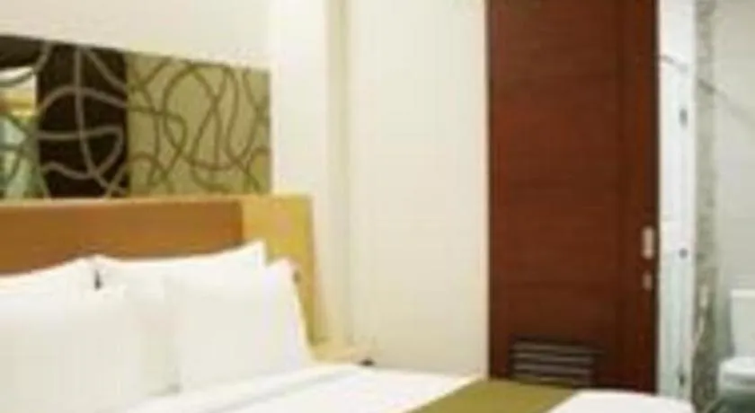 Bed in Sub City Hotel