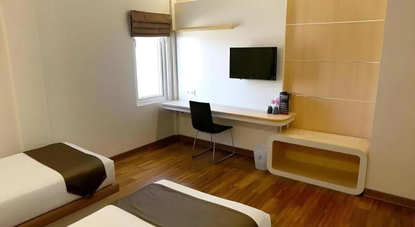 Bed in Sub City Hotel