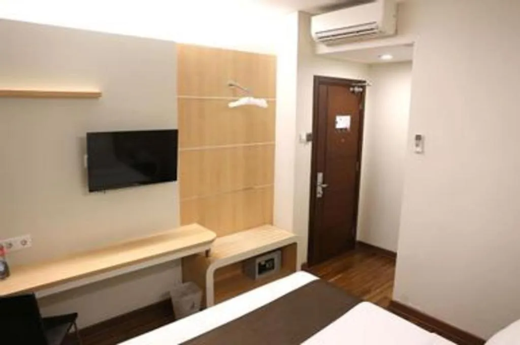 Bed in Sub City Hotel