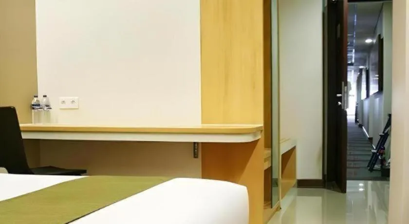 Bed in Sub City Hotel