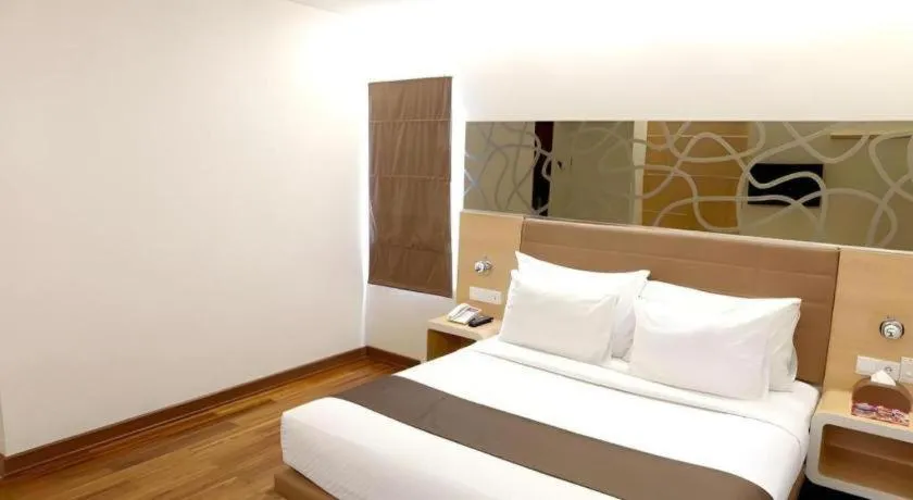 Bed in Sub City Hotel