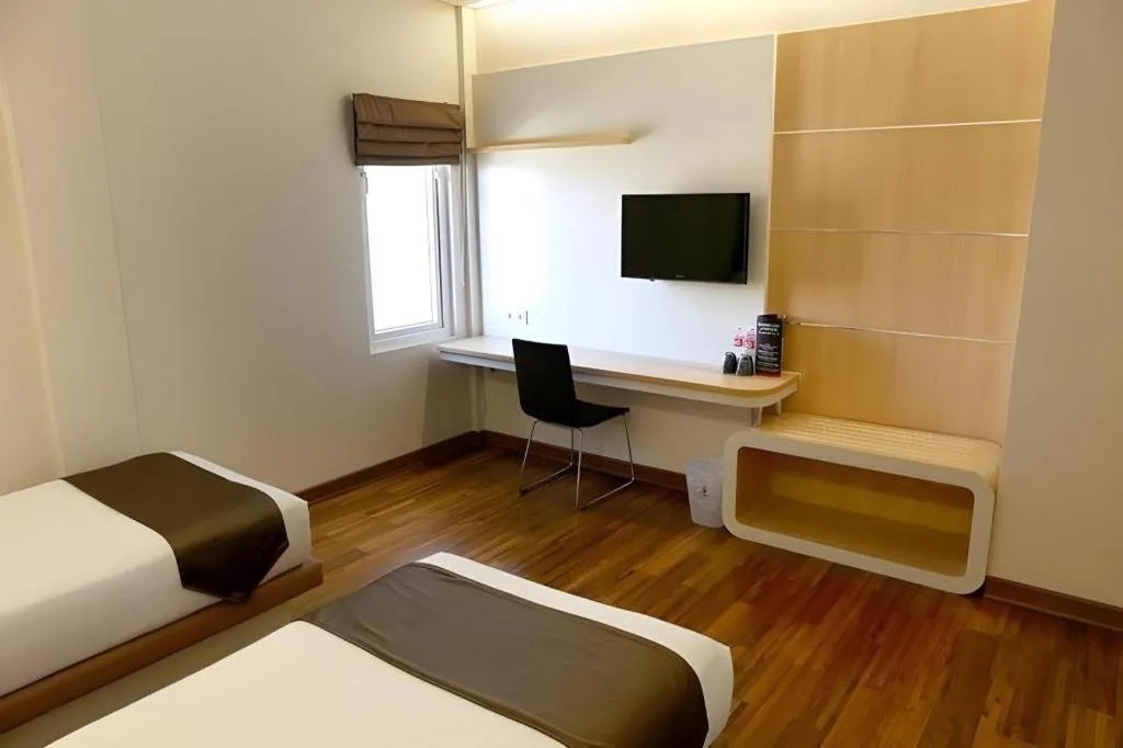 Bed in Sub City Hotel