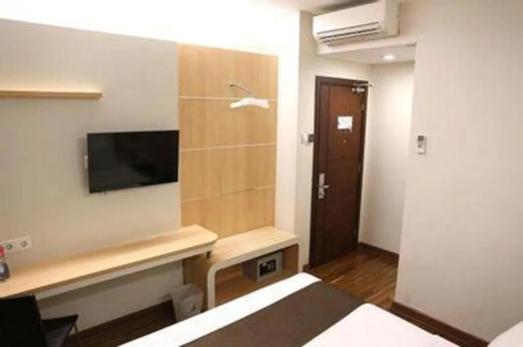 Bed in Sub City Hotel