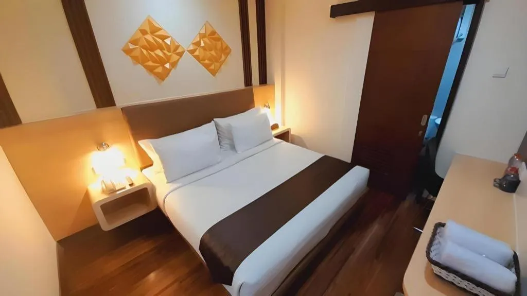 Bed in Sub City Hotel