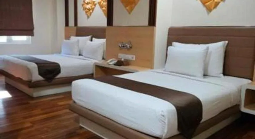 Bed in Sub City Hotel