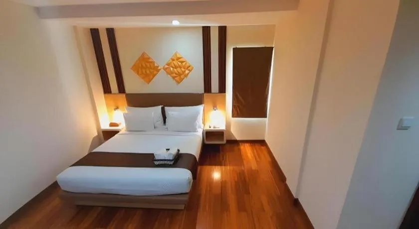 Bed in Sub City Hotel