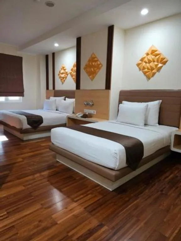 Bed in Sub City Hotel