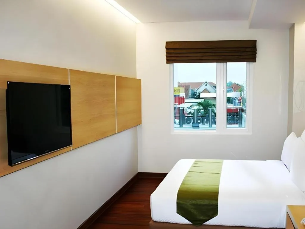 Bed in Sub City Hotel