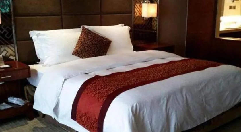 Bed in Blue Horizon International Hotel Gaomi