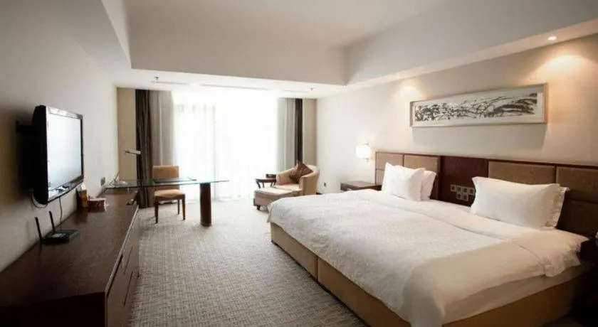 Bed in Blue Horizon International Hotel Gaomi