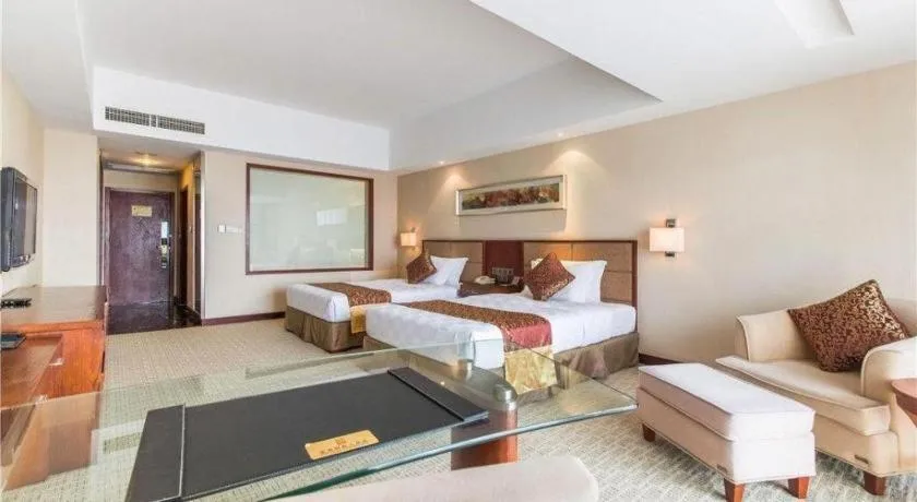 Bed in Blue Horizon International Hotel Gaomi