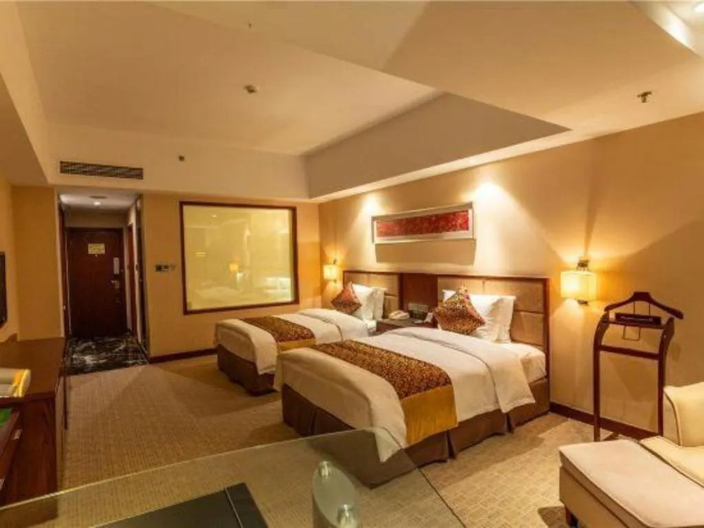 Bed in Blue Horizon International Hotel Gaomi