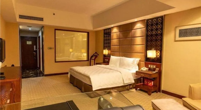 Bed in Blue Horizon International Hotel Gaomi