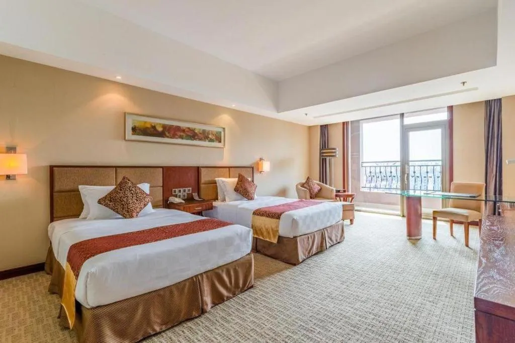 Bed in Blue Horizon International Hotel Gaomi