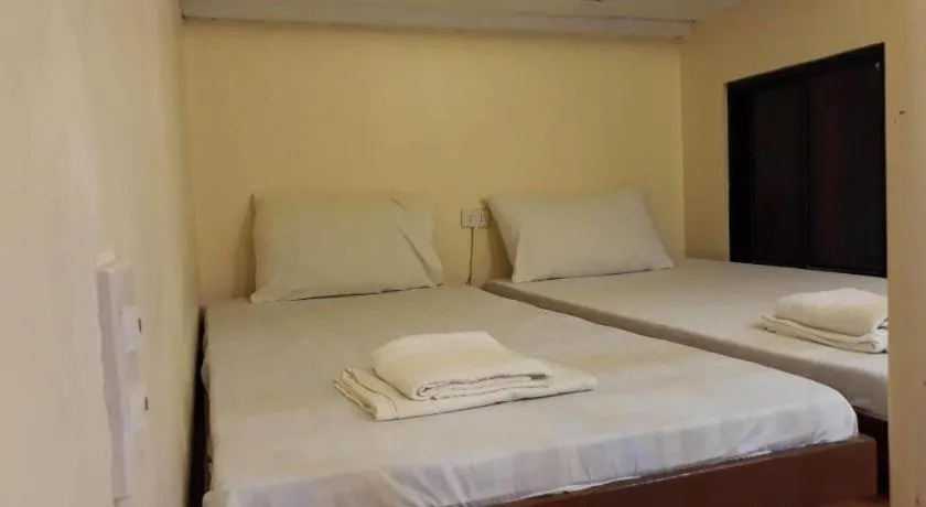 Bed in Rovic's Tourist Hotel