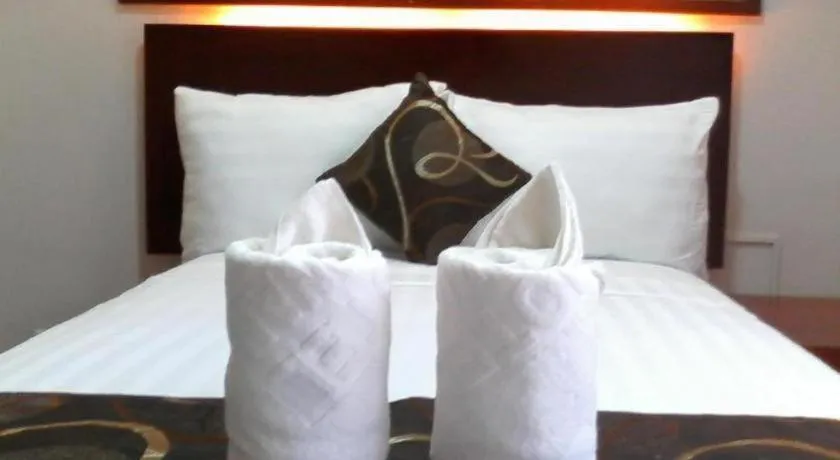 Bed in Rovic's Tourist Hotel