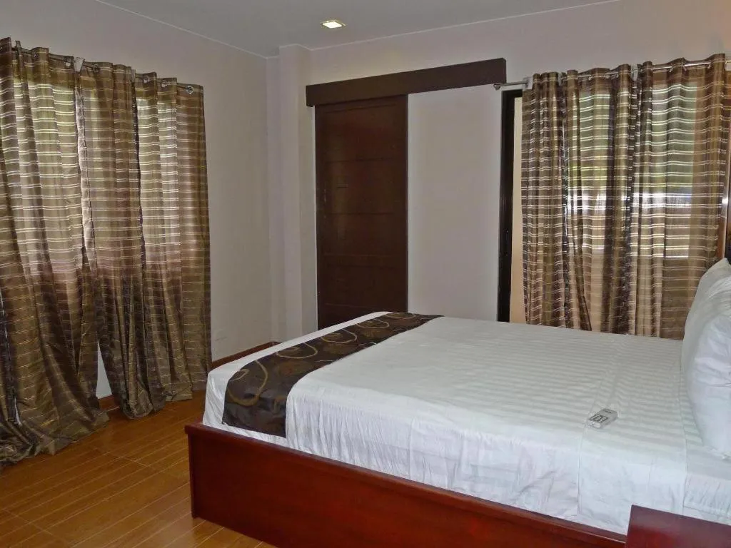 Bed in Rovic's Tourist Hotel