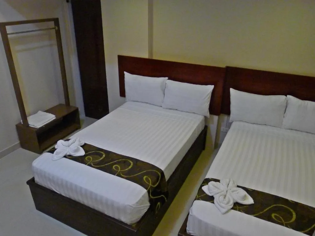 Bed in Rovic's Tourist Hotel
