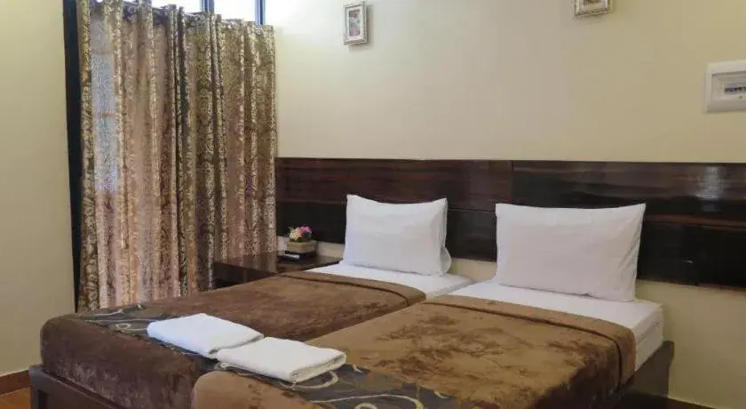 Bed in Rovic's Tourist Hotel Bed in Rovic's Tourist Hotel