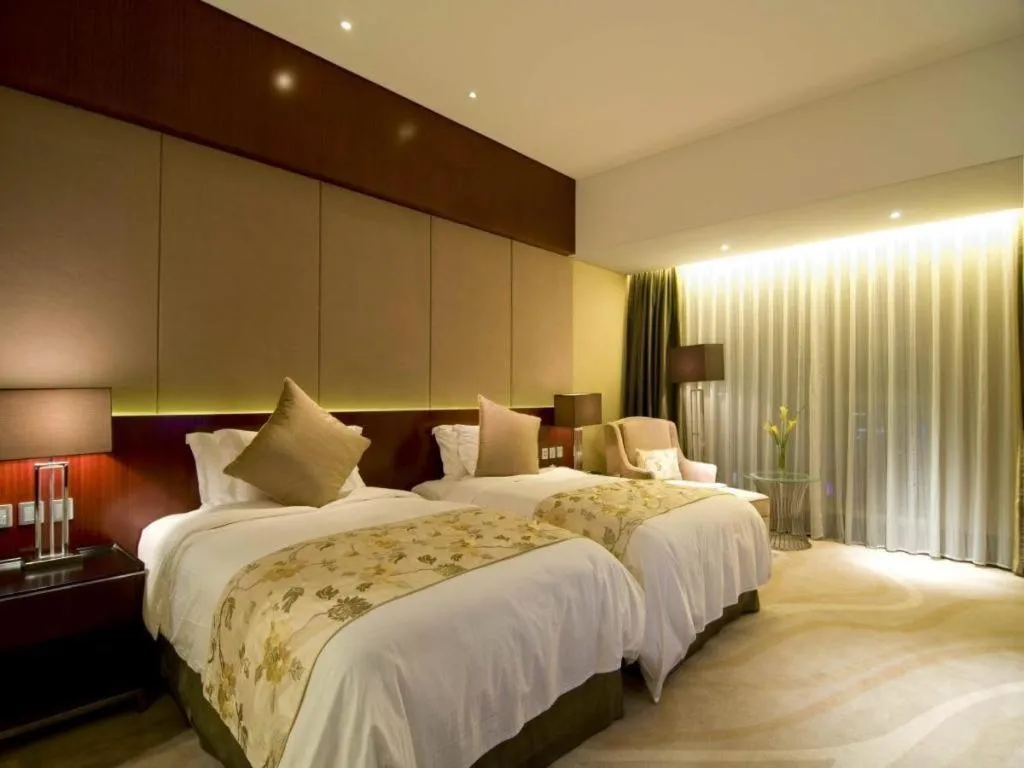 Bed in Quanzhou Jinjiang Hollyston Hotel