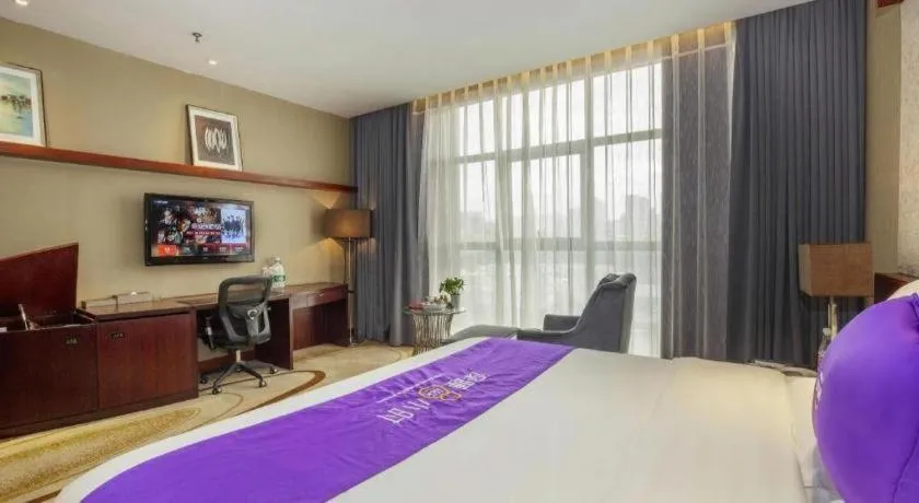 Bed in Quanzhou Jinjiang Hollyston Hotel