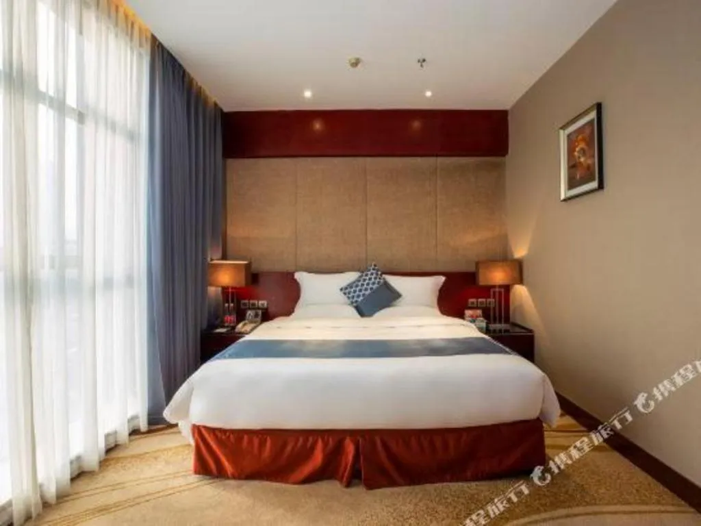 Bed in Quanzhou Jinjiang Hollyston Hotel