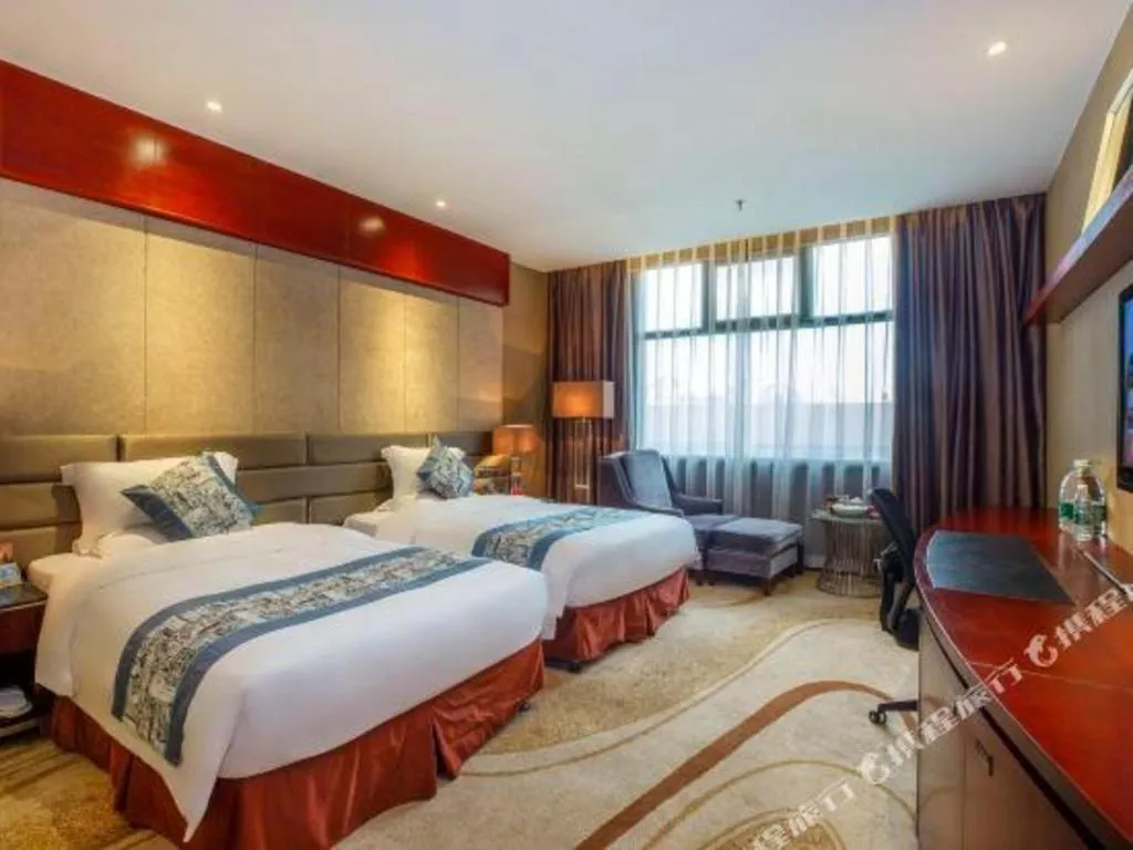 Bed in Quanzhou Jinjiang Hollyston Hotel