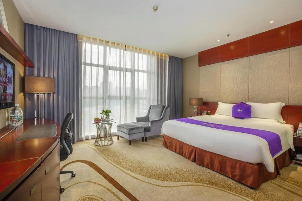 Bed in Quanzhou Jinjiang Hollyston Hotel