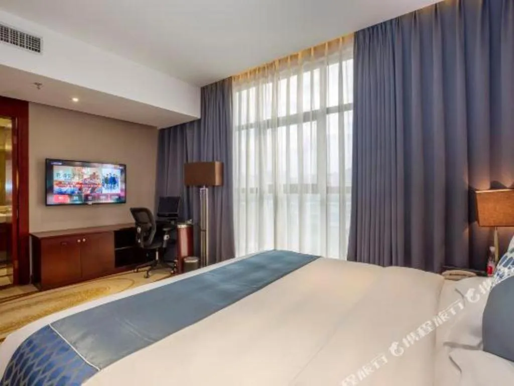 Bed in Quanzhou Jinjiang Hollyston Hotel
