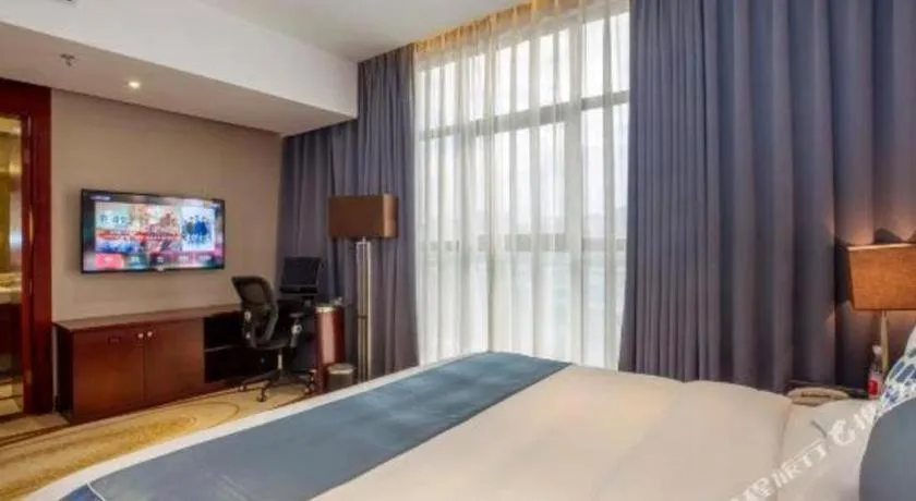 Bed in Quanzhou Jinjiang Hollyston Hotel